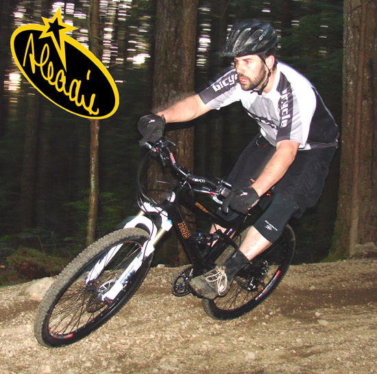The HSB Rhythm dual suspension mountain bike cornering
